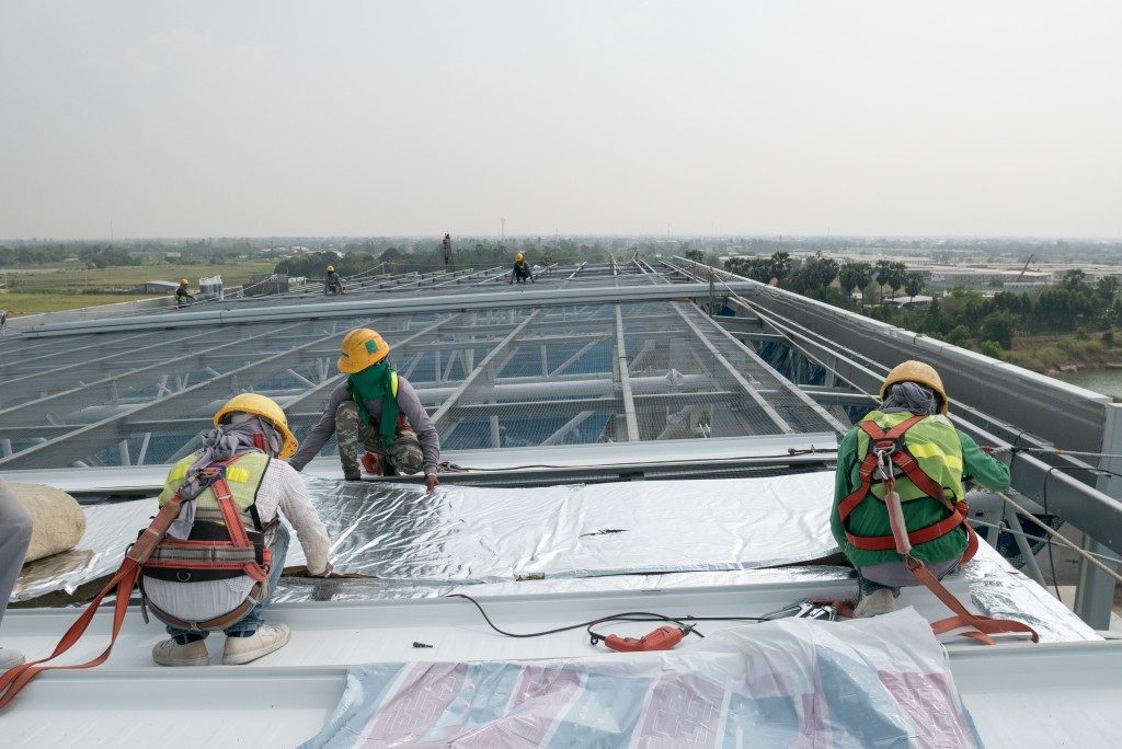 Men fixing the roof