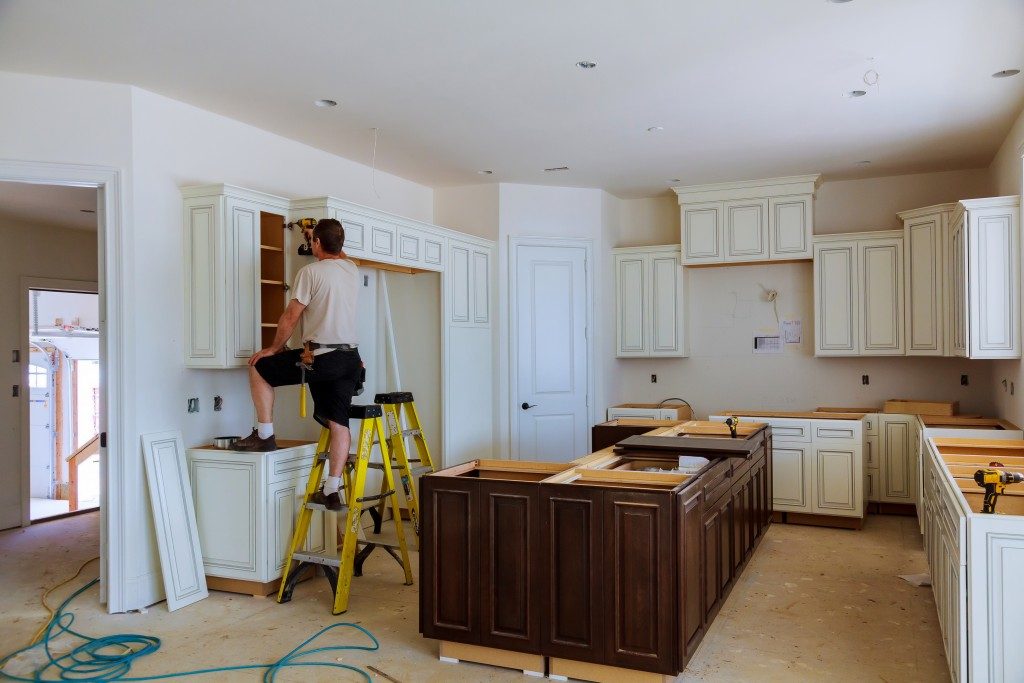 Repairing the kitchen cabinets
