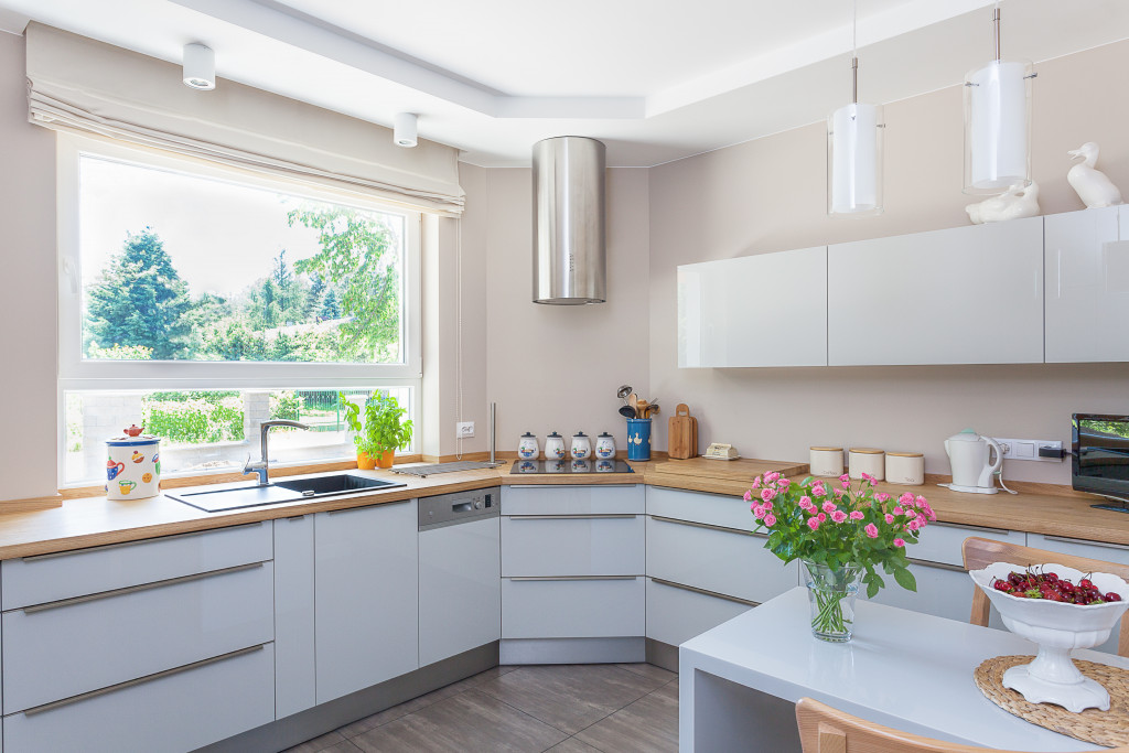 A bright kitchen with an open window