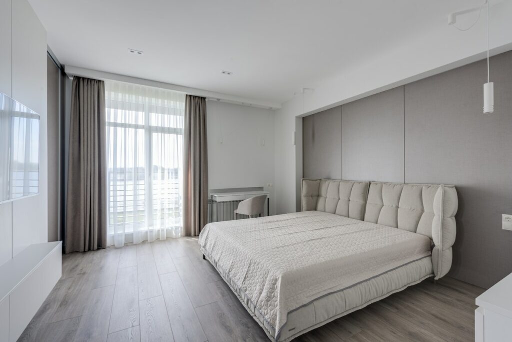 Comfortable bedroom with light stylish interior